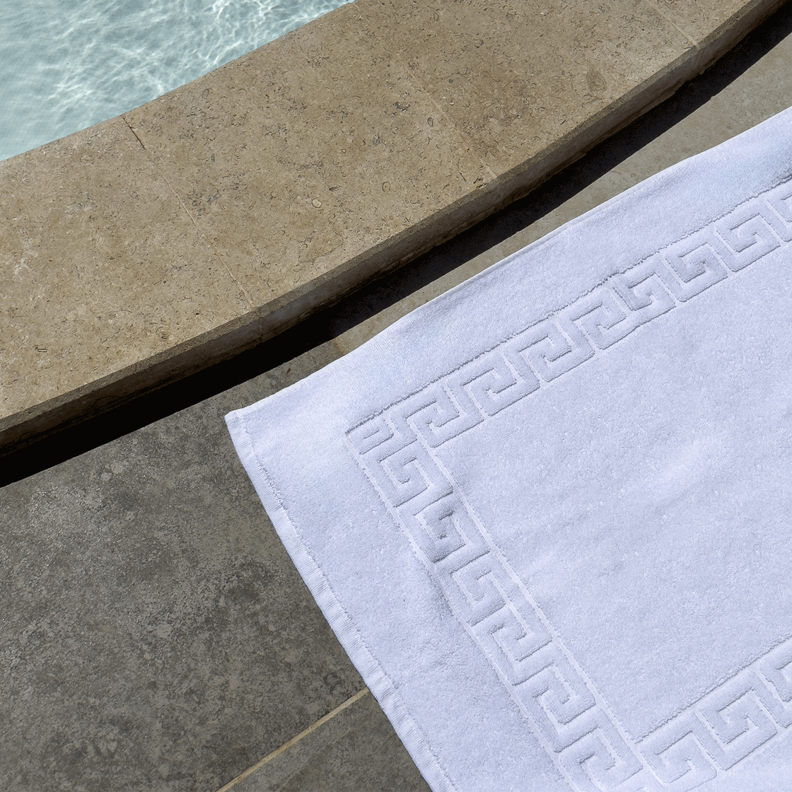 دواسة حمام فندقية من القطن - أبيض 850 جرام للمتر المربع